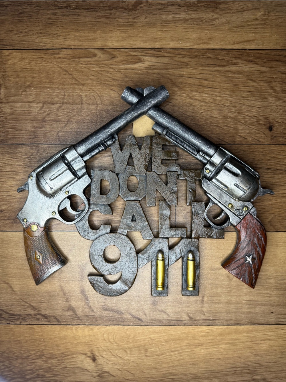 We Don't Call 911 Western Revolver Wall Art — Silver & Brown